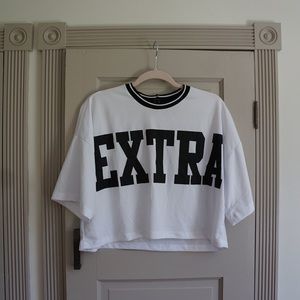 Forever 21 “EXTRA” jersey crop top.